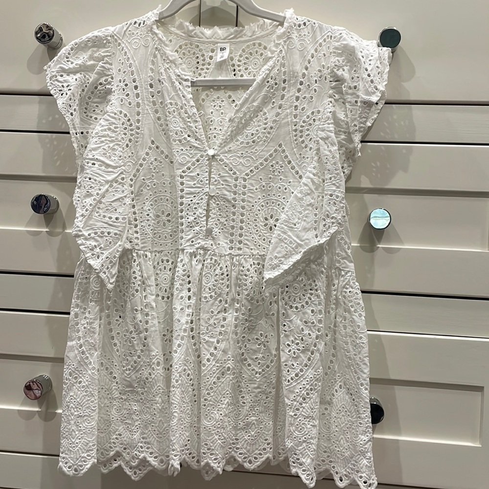 White eyelet ruffle sleeve top